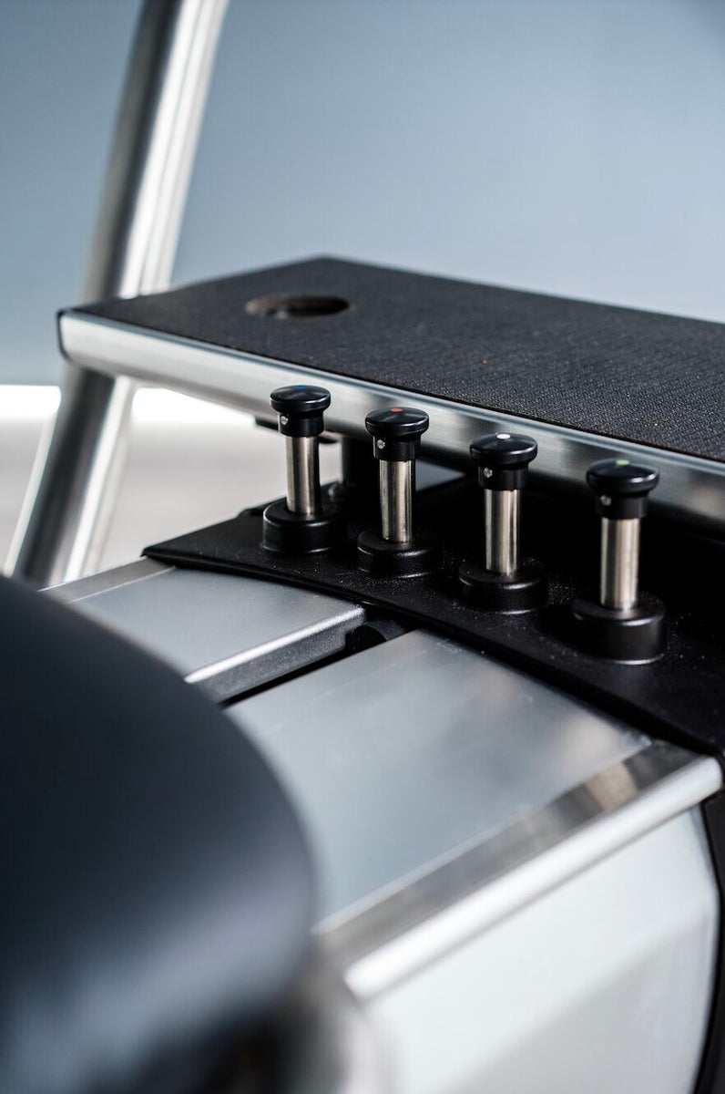 Push button resistance and tracking technology on the pilates reformer ...
